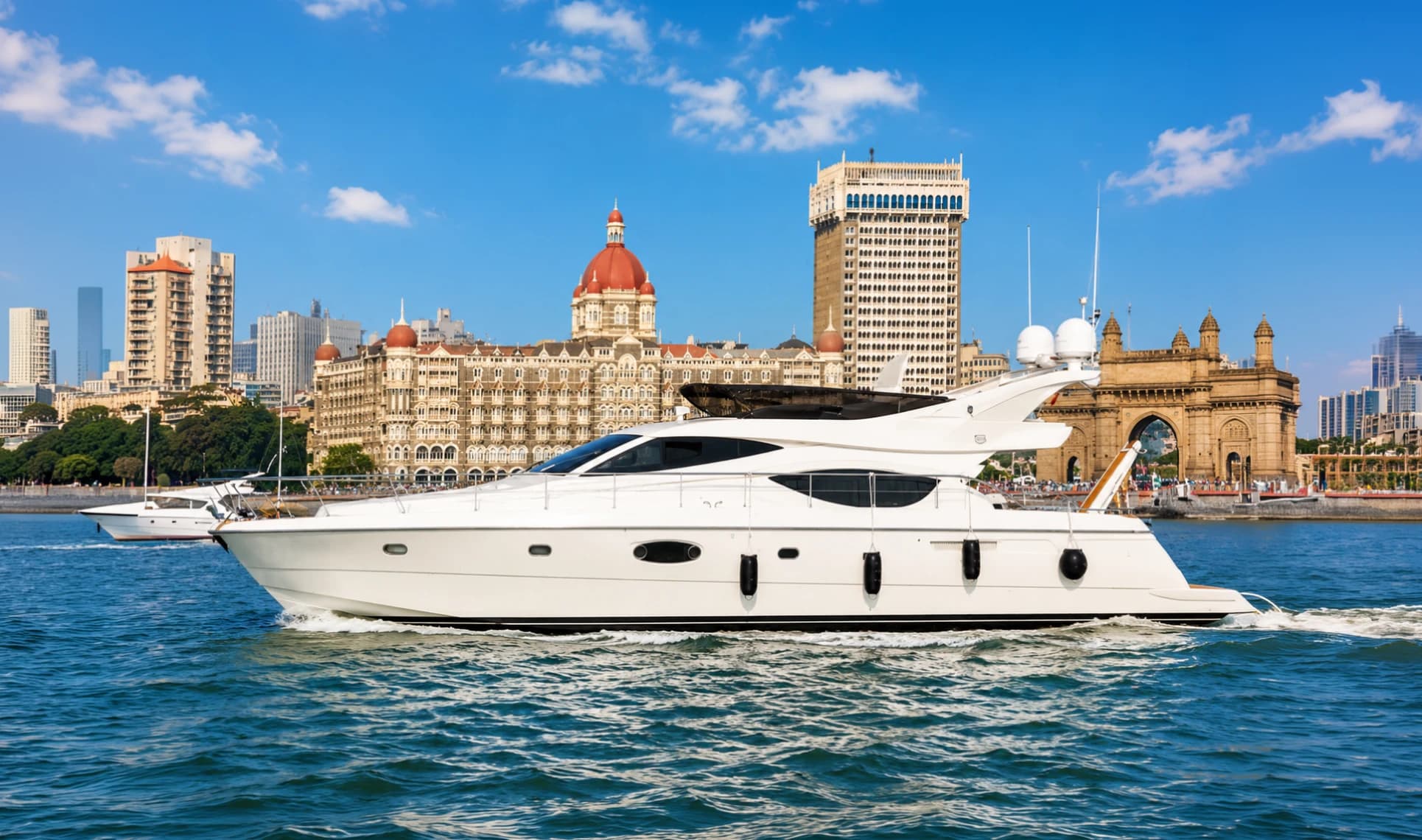 Allegra cruising past the Gateway of India and Taj Mahal Palace in Mumbai