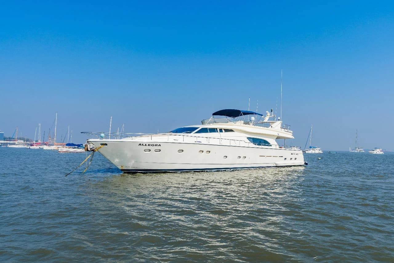 Allegra, a Ferretti 88 luxury motor yacht, underway off Mumbai with her name visible on the bow