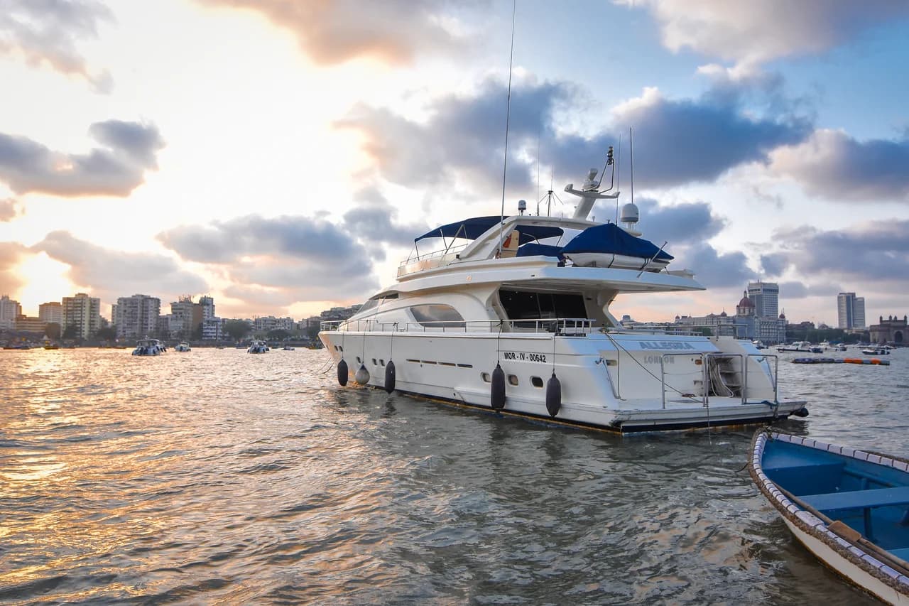 Allegra's stern at golden hour, showing her name, registration MOR-IV-00642 and home port London