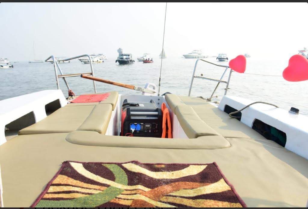 The foredeck decorated with red heart balloons for a celebration