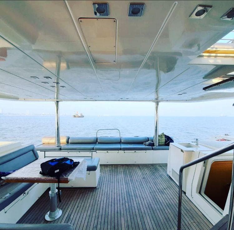 The wide aft cockpit deck with built-in bench seating
