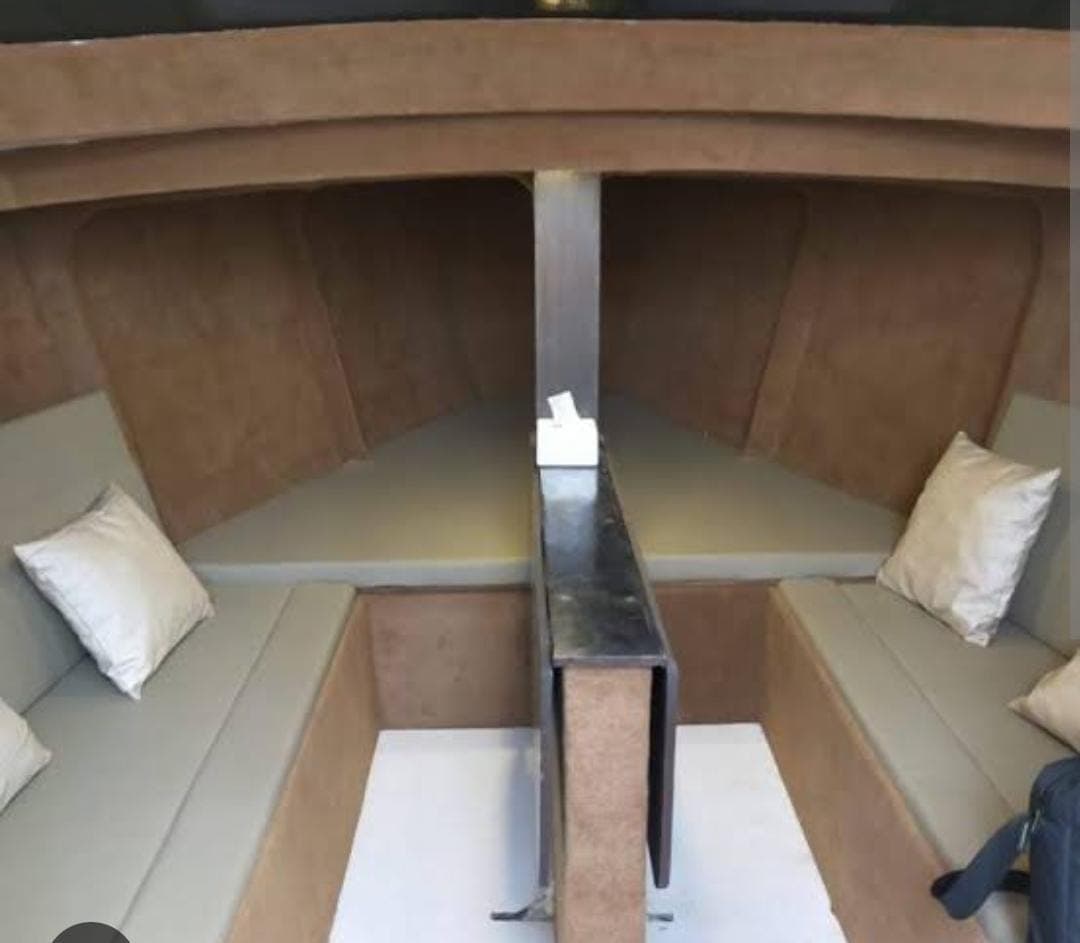 The below-deck cuddy with bench seating and cushions