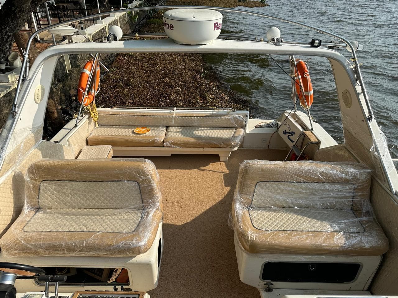 The aft cockpit seating with the river bank behind