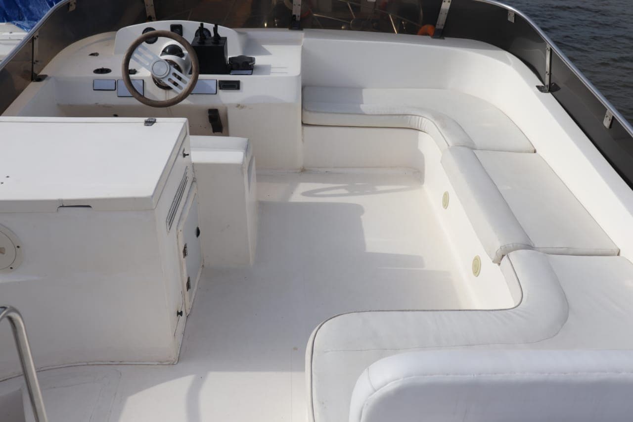 The flybridge helm and lounge seating