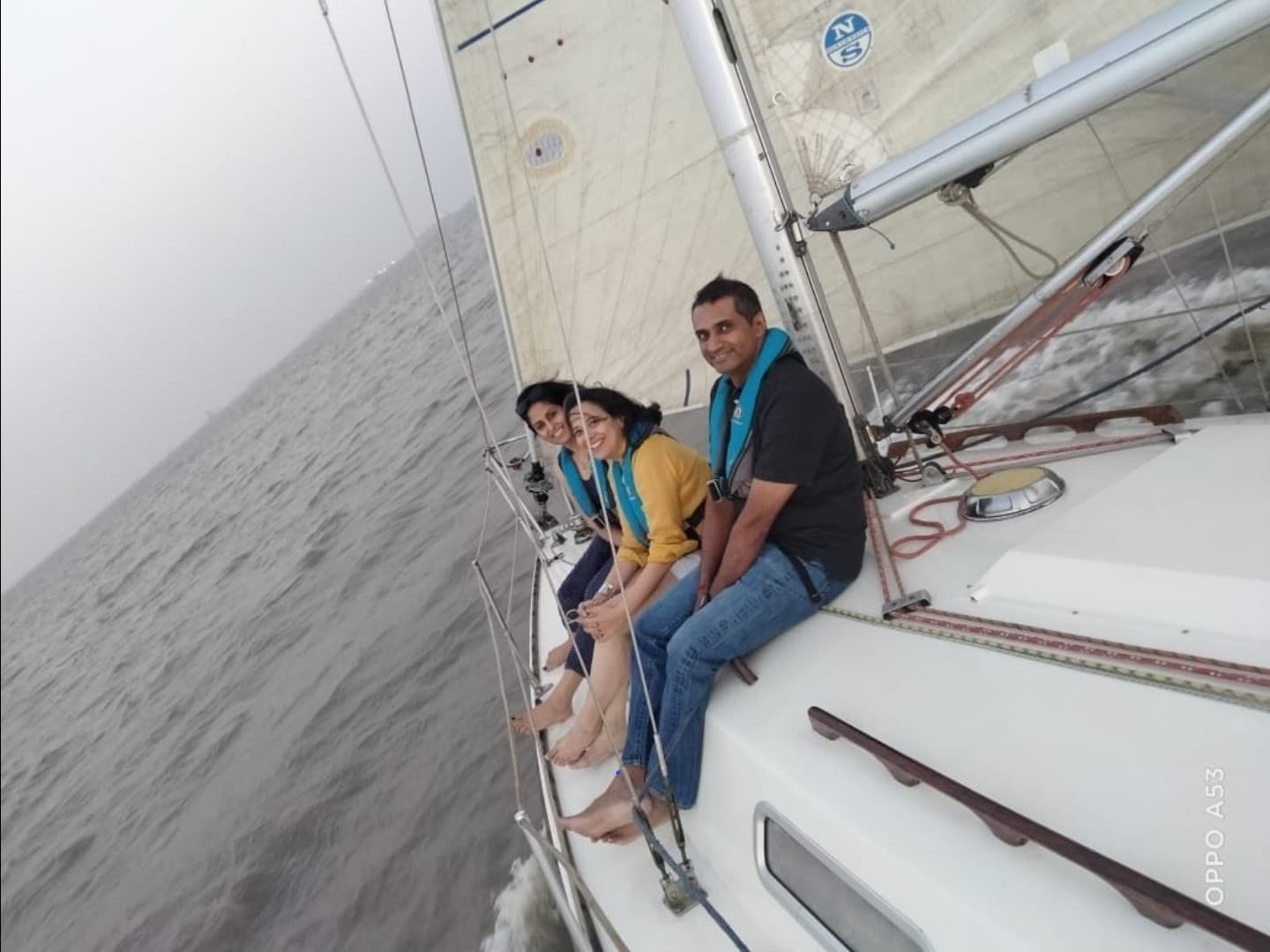 Guests seated at the bow as Tantallon heels under a genoa and mainsail