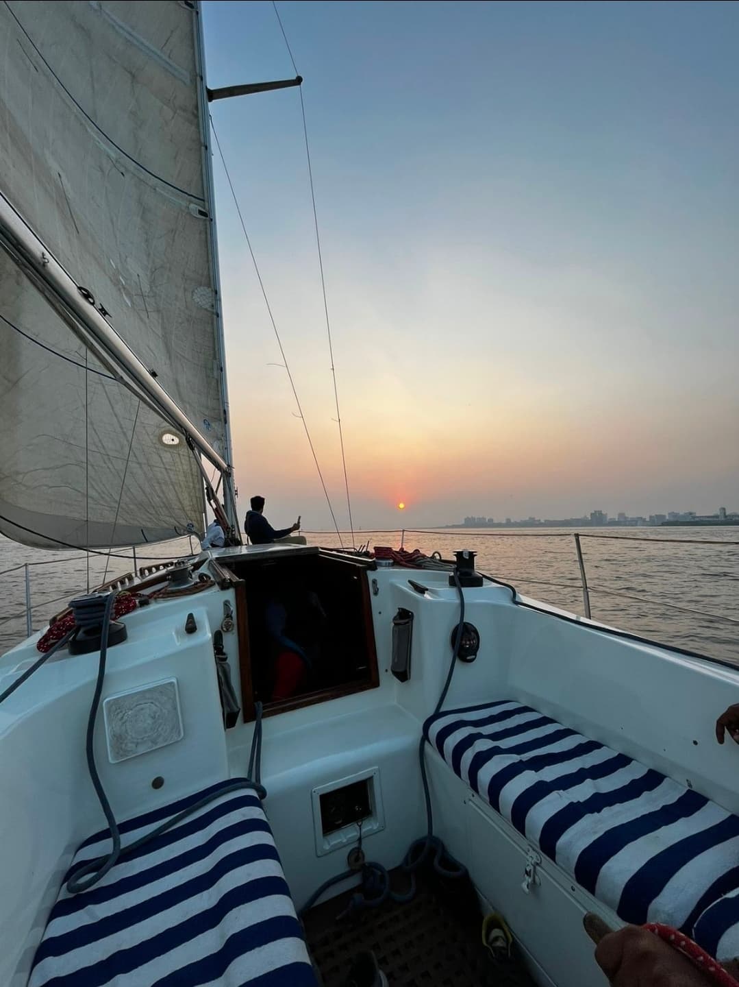 The cockpit and striped seating as Tantallon sails into the sunset