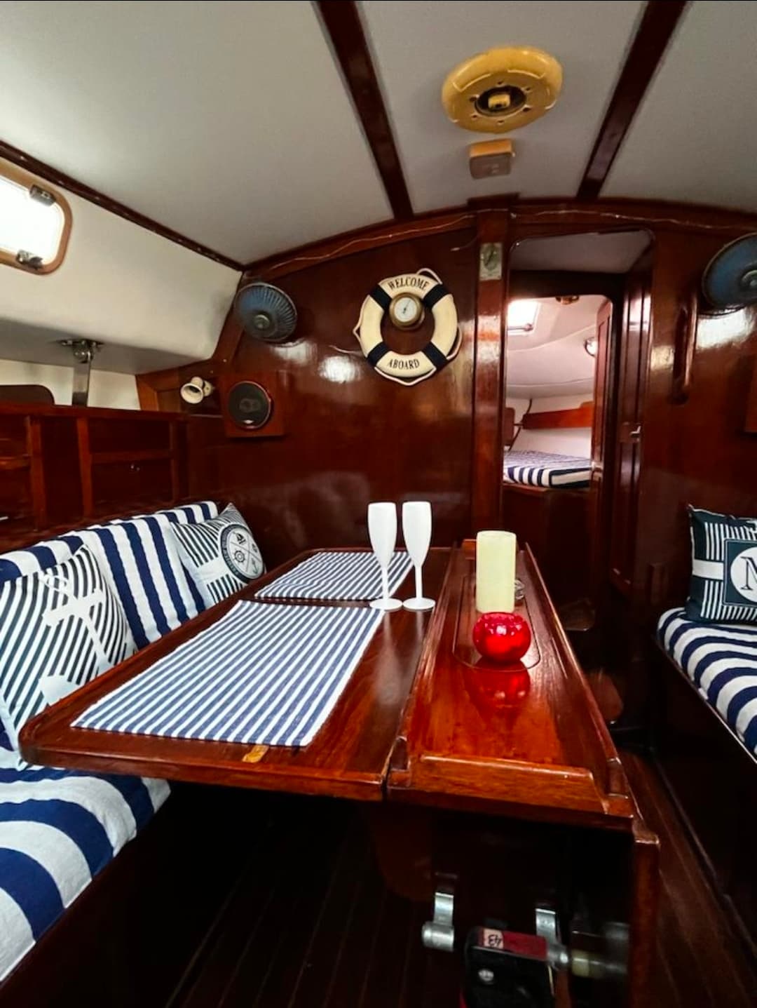 The saloon looking forward toward the V-berth cabin through the doorway