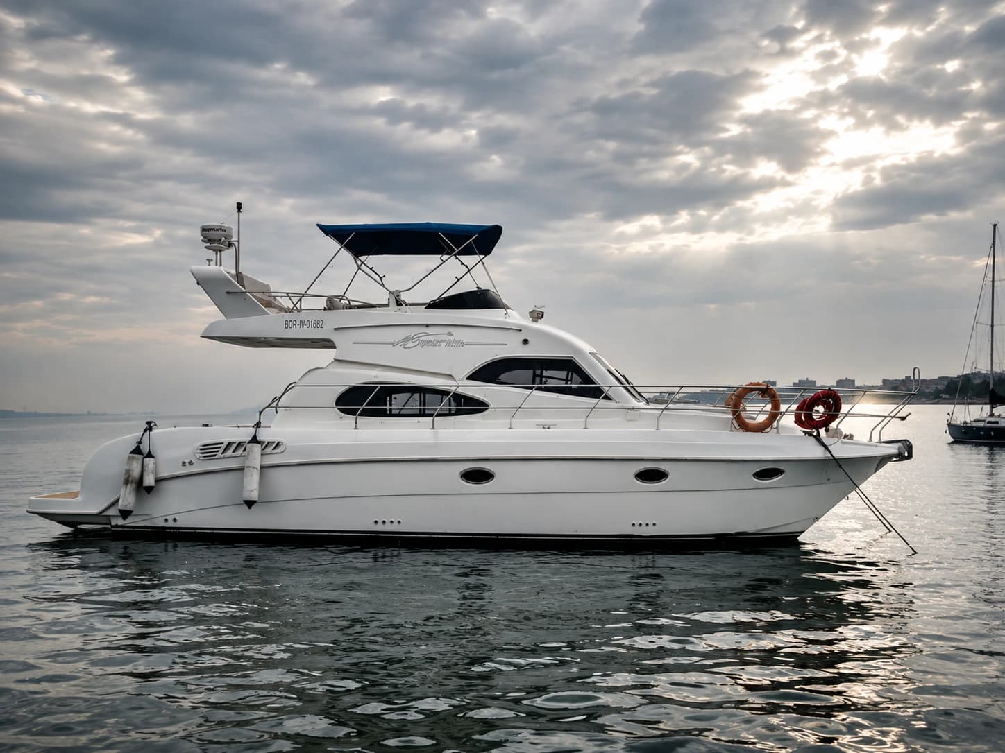 Vari 44's side profile at anchor at dusk